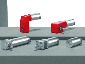 Compact extra-low voltage drives on a gray concrete block.