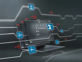 Laptop with industrial control software and icons for robotics, networks and processes.