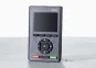 Black and gray keypad with a display, a large number of black keys, one red key and one green key